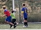Zdjęcie przedstawia uczestników Turnieju Piłki Nożnej "Z Orlika na Stadion" w trakcie rozgrywek.